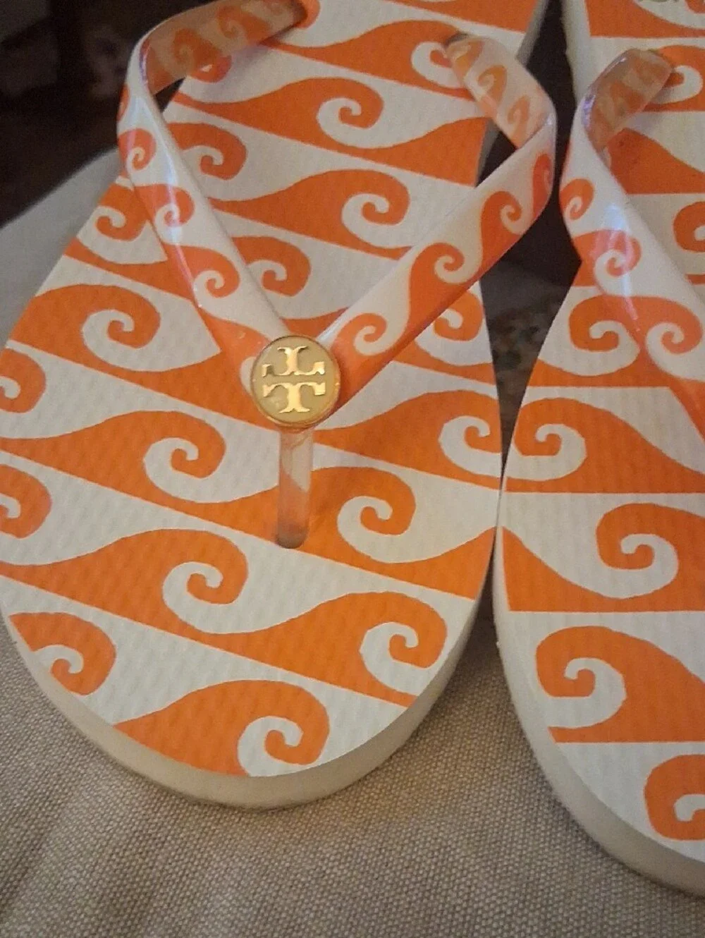 Tory Burch Orange & White Wave Flip Flop Sandals with Gold Logo